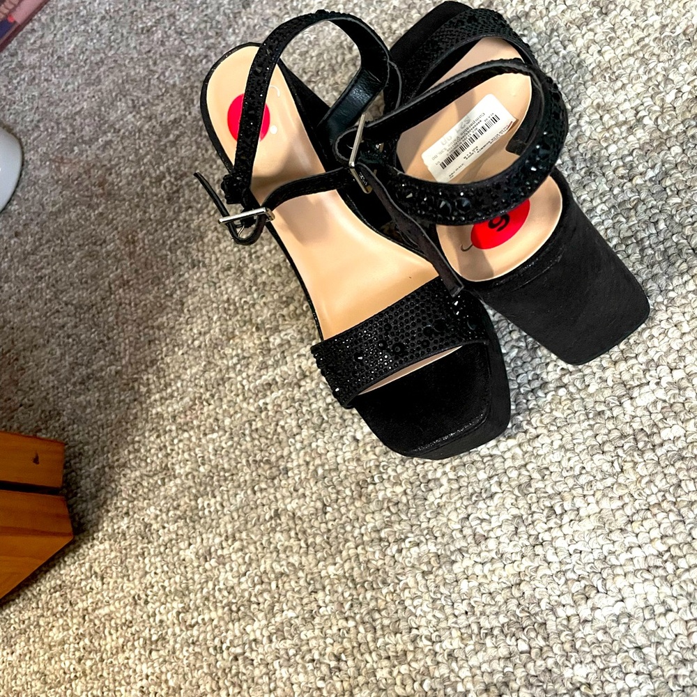 From Dadawen size 6 1/2. All black platform heels still tag brand new